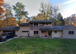 Pre-foreclosure in  MARIPOSA DR Wixom, MI 48393