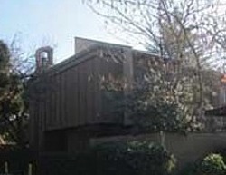 Pre-foreclosure in  WOODSIDE LN E UNIT 4 Sacramento, CA 95825