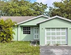Pre-foreclosure in  Nw 7th Ln Pompano Beach, FL 33060