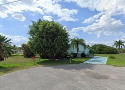 Pre-foreclosure in  Fisher Ct Lehigh Acres, FL 33936