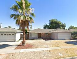 Pre-foreclosure in  E Holland Ave Fresno, CA 93726