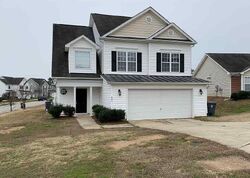 Pre-foreclosure in  Pyracantha Dr Holly Springs, NC 27540