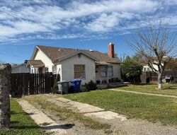 Pre-foreclosure in  Center Ave Dos Palos, CA 93620