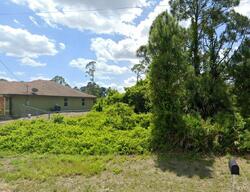 Pre-foreclosure in  Lausanne Ave S Lehigh Acres, FL 33974