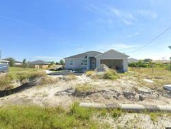 Pre-foreclosure in  NW 15TH ST Cape Coral, FL 33993