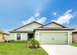 Pre-foreclosure in  Center Lake St Lehigh Acres, FL 33974