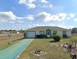 Pre-foreclosure in  33rd St SW Lehigh Acres, FL 33976
