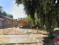 Pre-foreclosure in  E Madison Ave Fresno, CA 93701