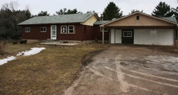 Pre-foreclosure in  THUMB LAKE RD Boyne Falls, MI 49713