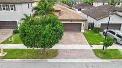 Pre-foreclosure in  Sw 118th Ct Homestead, FL 33032
