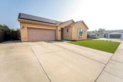 Pre-foreclosure in  Heather Ave Dinuba, CA 93618