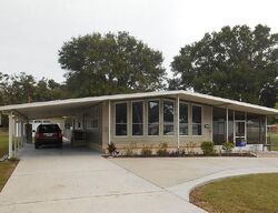 Pre-foreclosure in  Clearwater Lake Dr Polk City, FL 33868