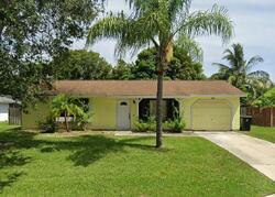 Pre-foreclosure in  SE Manor Ave Port Saint Lucie, FL 34952