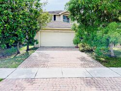 Pre-foreclosure in  Aurora Lake Cir Lake Worth, FL 33463