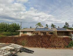 Pre-foreclosure in  W University Ave Fresno, CA 93722