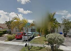 Pre-foreclosure in  Sw 11th Ct Pompano Beach, FL 33068