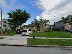 Pre-foreclosure in  Hammock Lakes Dr Melbourne, FL 32940