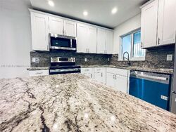Pre-foreclosure in  Nw 33rd Ct Opa Locka, FL 33056
