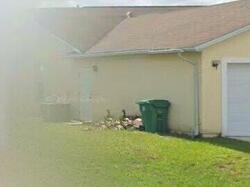 Pre-foreclosure in  Sw Pumpkin St Port Saint Lucie, FL 34953