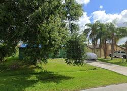 Pre-foreclosure in  SW Duval Ave Port Saint Lucie, FL 34983