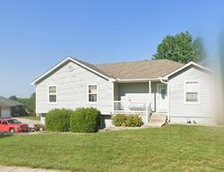 Pre-foreclosure in  Ne Maybrook Dr Grain Valley, MO 64029