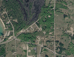 Pre-foreclosure in  Woburn Dr Traverse City, MI 49686