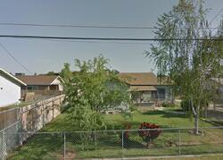 Pre-foreclosure in  Jasmine Ave Ivanhoe, CA 93235