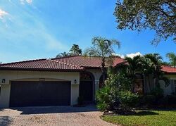 Pre-foreclosure in  Nw 103rd Way Pompano Beach, FL 33076