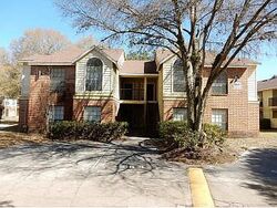 Pre-foreclosure in  FANCY FINCH DR UNIT 104 Tampa, FL 33614