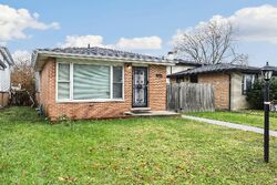 Pre-foreclosure in  Marshfield Ave Harvey, IL 60426
