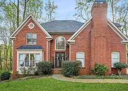 Pre-foreclosure in  Laurel Wood Dr Sw Marietta, GA 30064