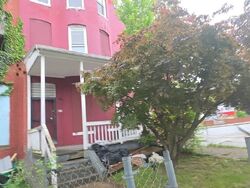 Pre-foreclosure in  W NORTH AVE Baltimore, MD 21216