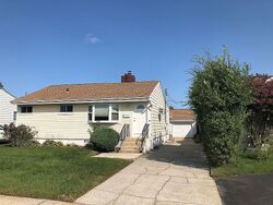 Pre-foreclosure in  Hubbard Ave Freeport, NY 11520