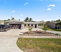 Pre-foreclosure in  Braeburn Pompano Beach, FL 33068