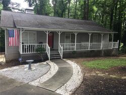 Pre-foreclosure in  MEADOWOOD LN Atlanta, GA 30341