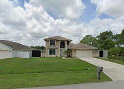 Pre-foreclosure in  Nw Volucia Dr Port Saint Lucie, FL 34986