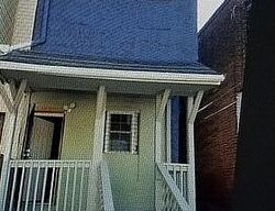 Pre-foreclosure in  E 20th St Baltimore, MD 21218