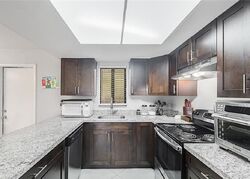 Pre-foreclosure in  Green Valley Cir Unit 1002 Naples, FL 34104