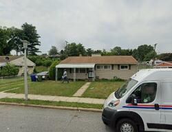 Pre-foreclosure in  Evanshire Ave Baltimore, MD 21206