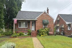 Pre-foreclosure in  Poplar Ave Baltimore, MD 21224