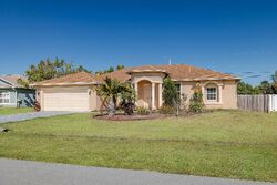 Pre-foreclosure in  Sw Merchant Ln Port Saint Lucie, FL 34953