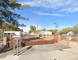 Pre-foreclosure in  W Fort Lowell Rd Tucson, AZ 85705