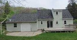 Pre-foreclosure in  WOODBUSHE DR SE Lowell, MI 49331