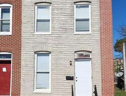 Pre-foreclosure in  E Chase St Baltimore, MD 21213