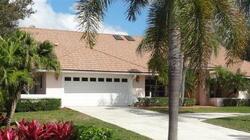 Pre-foreclosure in  MEADOW WOOD DR West Palm Beach, FL 33414