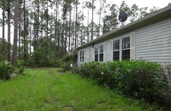 Pre-foreclosure in  PINE WOODS RD Ormond Beach, FL 32174