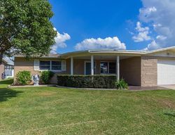 Short-sale Listing in LYRA DR HOLIDAY, FL 34690