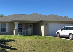 Short-sale Listing in NE JUANITA PL CAPE CORAL, FL 33909