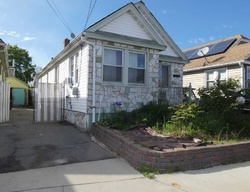 Short-sale Listing in 128TH AVE JAMAICA, NY 11434