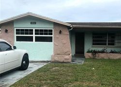 Short-sale in  RAVEN DR Holiday, FL 34690